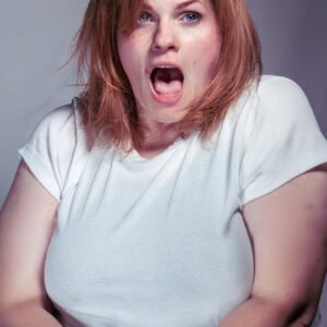 A woman with a surprised look on her face